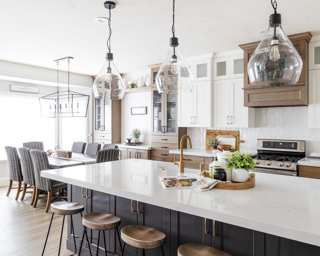 Kitchen with center island and bar stools, perfect for entertaining guests.